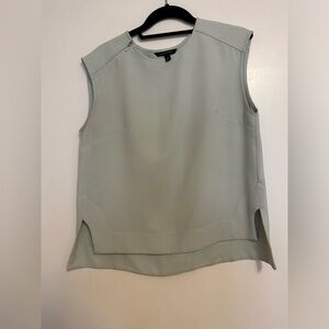 Mint green banana republic top with zipper on shoulder and side slit